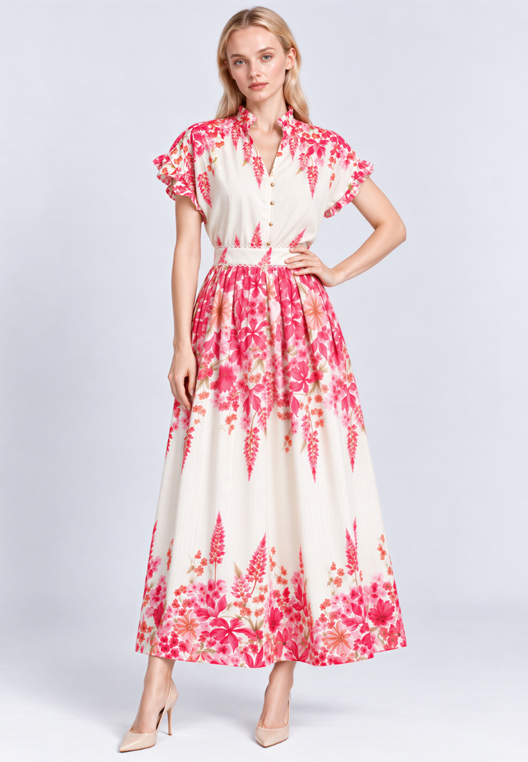 A woman modeling A-line skirt with a cream base and a vibrant pink floral print, standing against a light gray studio background.