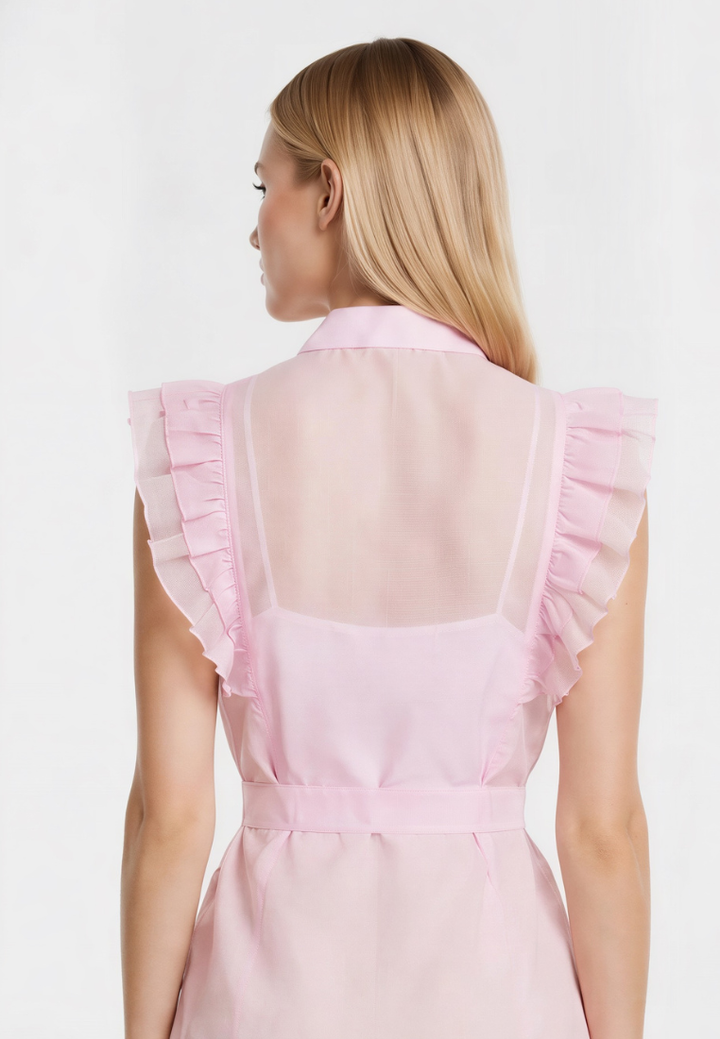 Love Knot Poppy blouse, back view showing ruffle shoulders and peplum hem