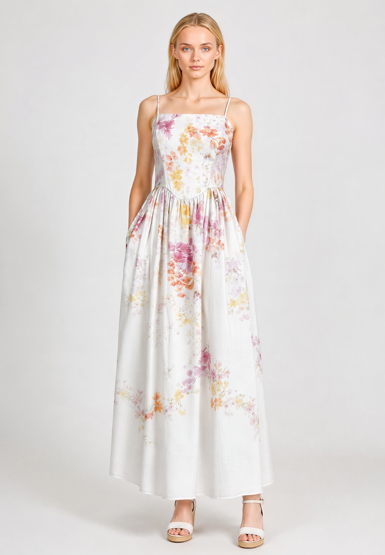 Love Knot Aurora white floral maxi dress, front view showing gathered waist and flowing skirt