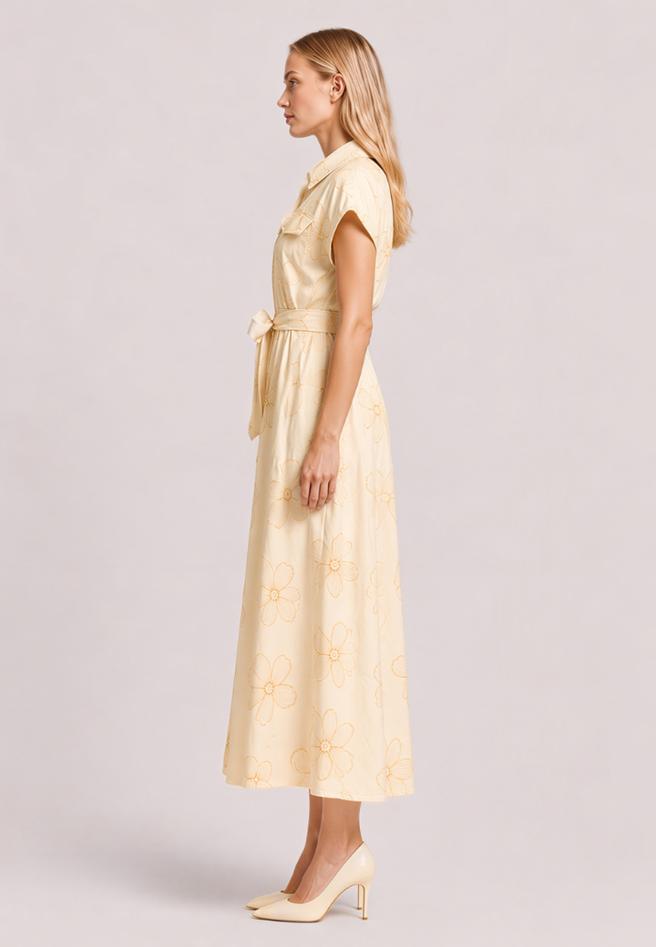 Love Knot Nora shirt dress, side view showing midi length and floral embroidered hem