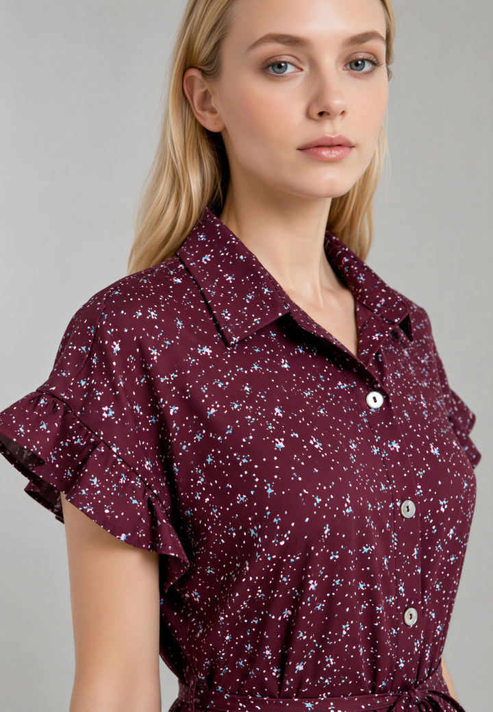 Close-up of Love Knot Linnea burgundy dress, pearl buttons and ruffle sleeve detail