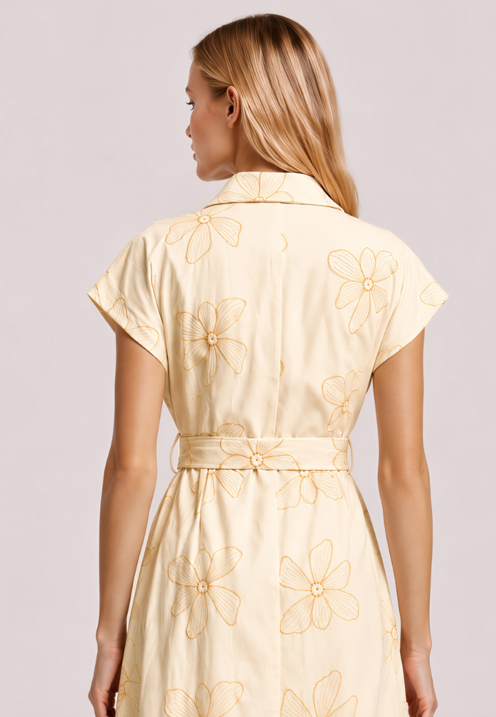 Love Knot Nora beige midi dress, back view showing shoulder fit and skirt fall