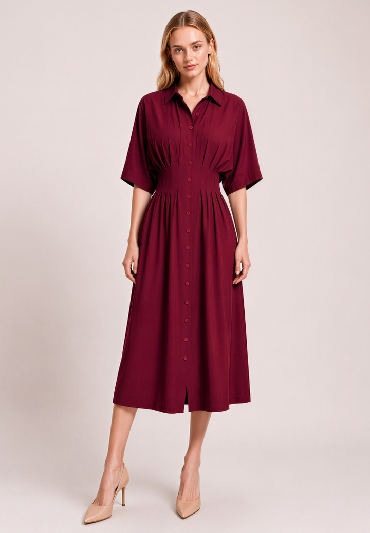 Woman wearing Love Knot Melissa burgundy pleated midi dress, front view with shirt collar and cinched waist